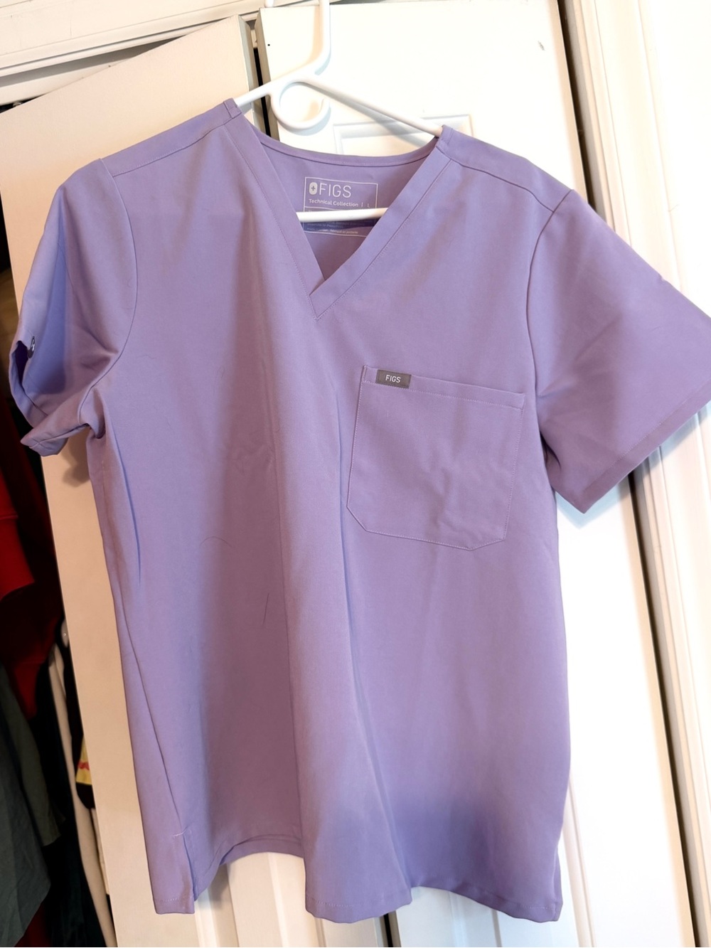 FIGS Women’s Catarina One-Pocket Scrub Top in Lavender Dew